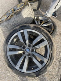 2016 Subaru WRX Rims with tires.
