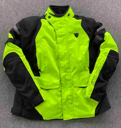 This like-new Women's Motorcycle Jacket (Size Large) is ready for your next adventure! REV'IT! Women...