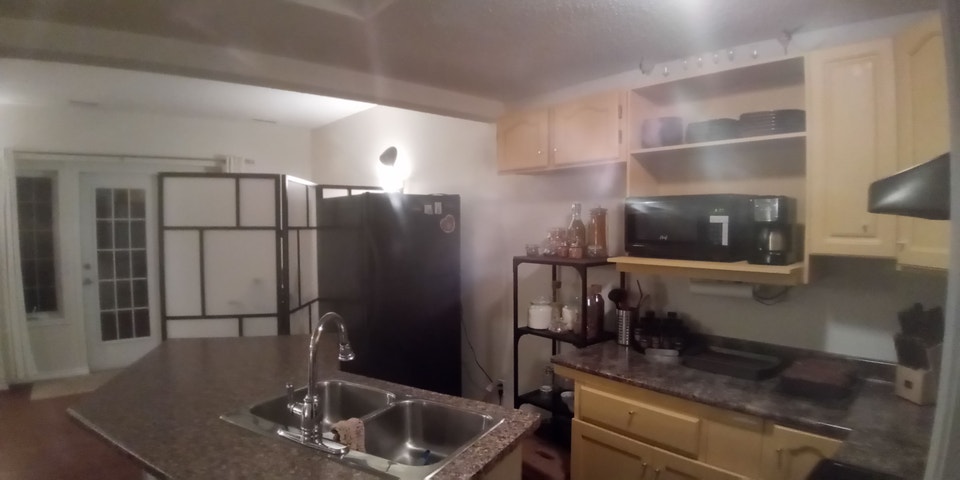 Spacious Split Level 1 Bedroom Basement with Storage & Fireplace 5