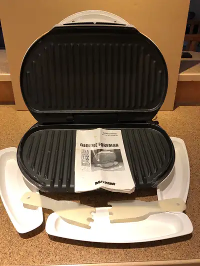 George Foreman lean mean fat grilling machine , View more