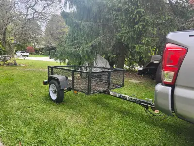 Utility Trailer 4x5. With gate at the back for better loading. Led lights working, 1-7/8 ball, 4 pin...