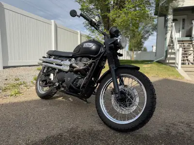 This ultra reliable air cooled, EFI equipped 2012 Triumph Scrambler 900 delivers on the history and...