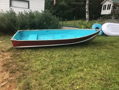 70s vintage aluminium 12' cartopper. Lots of dents here and there - does not leak. Dan. mcmack at ho...