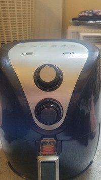 New Air deep fryer.  No oil needed to cook food . Never used