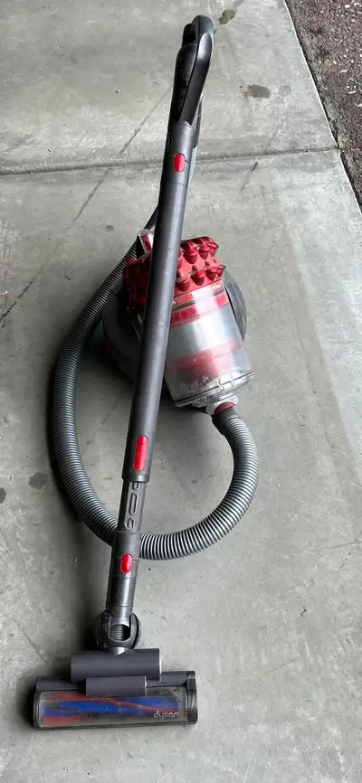 This Dyson vacuum cleaner is a powerful cleaning machine! It's designed to tackle dirt and dust with...