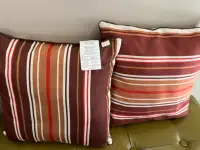 2 square outdoor cushions (1 used & 1 new)