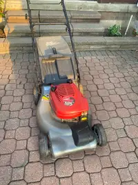 21” Toro gas self propelled lawn mower with bag