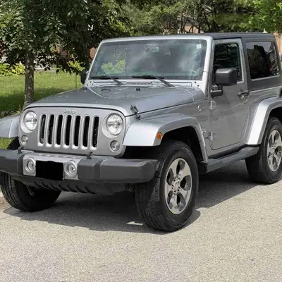 Clean, well-maintained 2-door Wrangler Sahara. Fully stock — no modifications, all original. Just un...