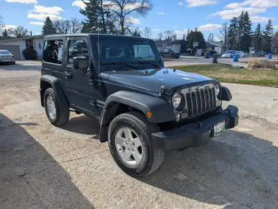 One owner Jeep Wrangler Sport bought brand new at Eastern Chrysler Dodge. No accidents and always de...