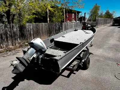 14ft black aluminum fishing boat—no-nonsense, lightweight, and loaded with extras. Features & Includ...