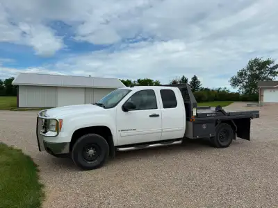 2008 GMC Sierra SLE 3500HD extended cab with Falcan bale deck. Original owner. Truck is very clean....