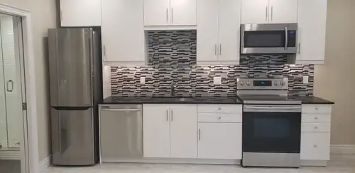 This stunning 1-bedroom luxury basement apartment features modern finishes, a bright open-concept ki...