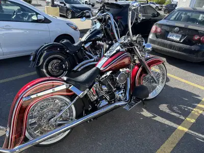 2013 Harley Softtail Deluxe professionally converted to a Cholo. No engine work yet but almost every...