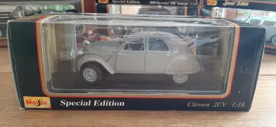 Citroen 2 cv toit ouvert 1/18 Maisto Plusieurs milliers, de modèles en inventaire, Neufs et usagés d...