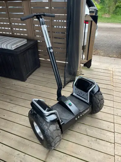 Off-road self balancing personal transporter. 19” tires. Can reach speeds of 18km/ hr. Comes with ne...