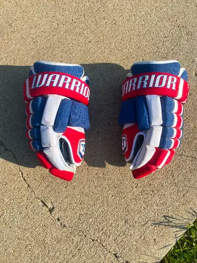 I have a pair of Warrior pro gloves from the Montreal Canadians they are new…. own a pair of real pr...
