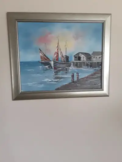 A stunnong painted picture of a ship framed, View more