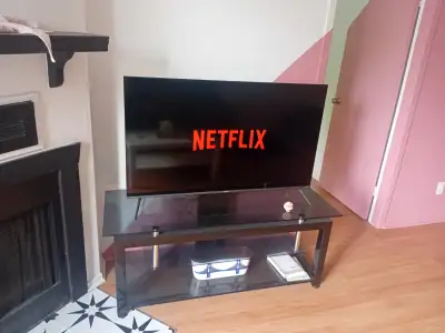 50 inch Smart TV + 52 inch wide TV Stand - Both for $580, View more