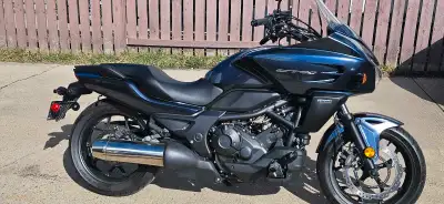 For sale is a used 2015 Honda CTX700,lady driven and owned. a versatile motorcycle known for its com...