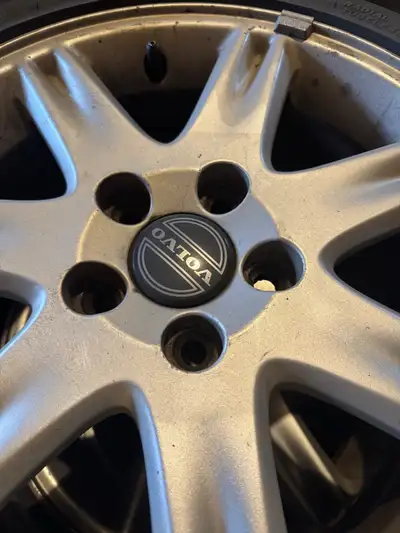 Set of 4 genuine Volvo OEM alloy rims with Motomaster Certified All Trek all-season tires (205/55R16...