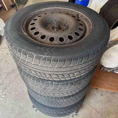 I'm selling a set of four Winter Dynamo tires, size 225/65R17, mounted on steel rims. These tires ha...