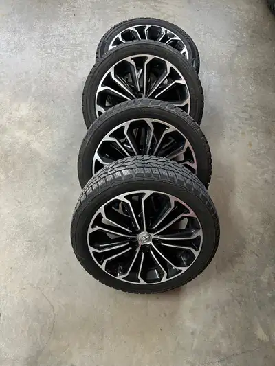 Set of 4 Cooper winter tires on Toyota aluminum alloy rims. Also have a fifth tire not on a rim. App...