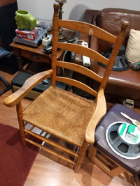 Ladder back chair possible antique in useful shape and strong