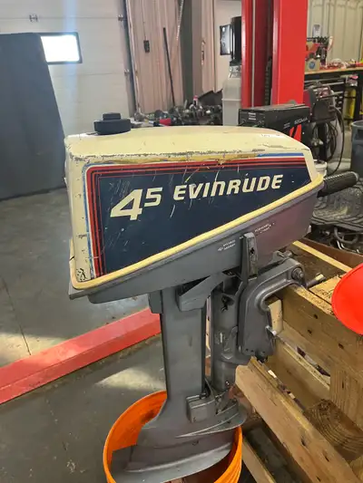 4.5hp Evinrude Boat Motor from the early 80s. Runs and works as should, gas tank built in on this mo...