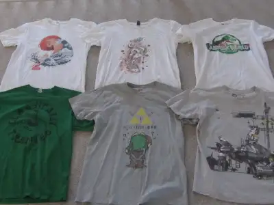 Six graphic t-shirts to choose from. These are all large adult. Asking $10.00 per shirt. Ad will be...