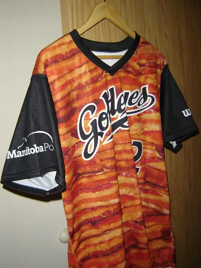 Winnipeg Goldeyes Bacon Night Jersey #32. Game worn. Single use. Autographed. Not sure what year or...