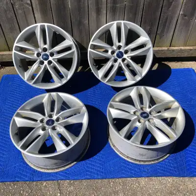 Rims are from a Ford Escape. 5 x 108mm (5 x 4.25”) bolt pattern. Rims are in very good condition wit...