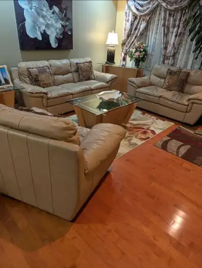 - Real Leather; Tan Coloured - Dimensions: 1) Sofa - 3 seats - 92" L x 39" H x 36" W 2) Loveseat - 2...