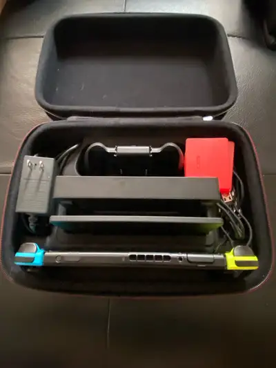 Nintendo Switch + 3 games + Carrying Case, View more
