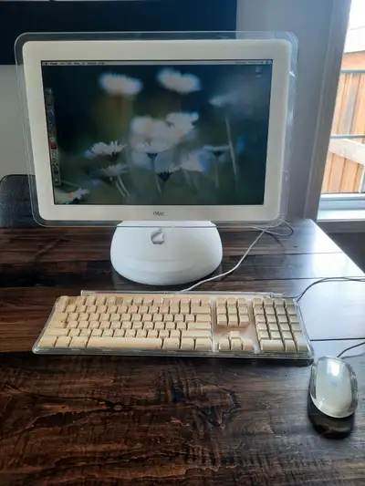 Still working condition bought in 2003 Apple iMac 4G. Keyboard yellowed