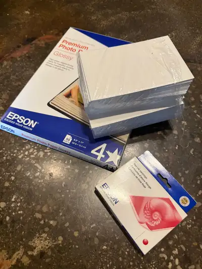 Epson premium glossy photo paper 8.5” x 11”. Still have around 36 sheets left. Some other glossy 4x6...