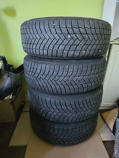 Michelin Winter Tires set of four Michelin Winter Tires, size 245/65R17, mounted on steel rims. Thes...