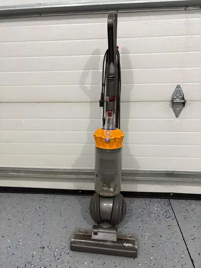 Selling this Dyson Upright Vacuum Cleaner For parts The suction barely works anymore Wire has a sect...