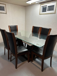 Glass dining table with 6 chairs 