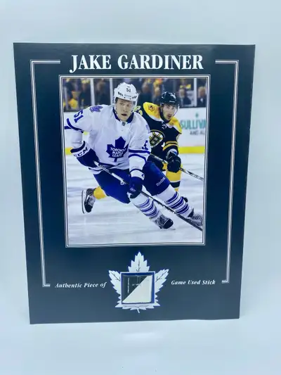 Jake Gardiner Toronto Maple Leafs Piece of Game Used Stick -Grates of the Game COA -Size is 8x10 -Ju...