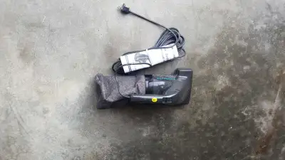 Corded hand held dust buster vacuum.