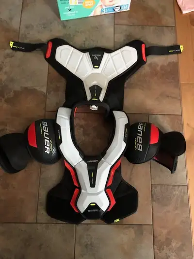 brand new Bauer vapor x shift pro chest protector size is xl please call 233-9919. if no answer plea...