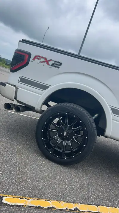 Looking to sell a set of wheels and tires off my F-150. Wheels are 22x12 Fast Traxx and tires are 30...