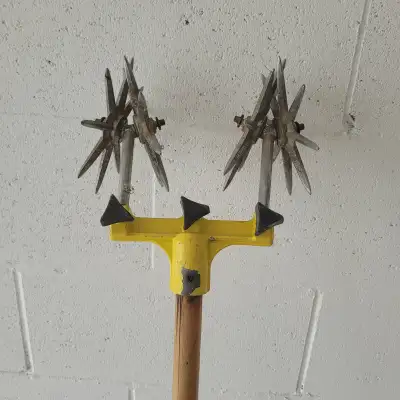 This is a good lawn & garden tool for soil mixing or reseeding grass lawn with a long wooden handle....