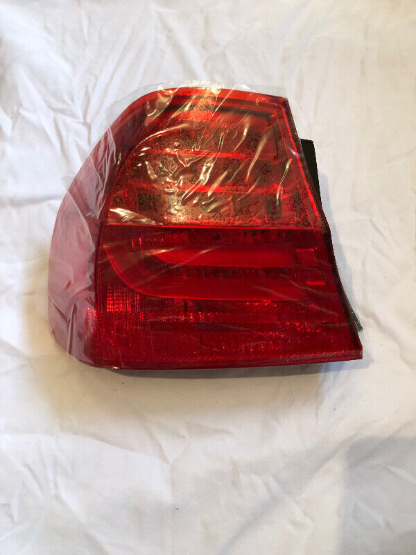 New OEM 2009 - 2011 BMW E90 328i, 335xi tail light, driver side in Auto Body Parts in Mississauga / Peel Region