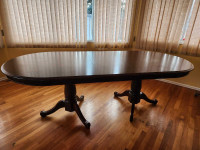 Dinning table with a leaf.