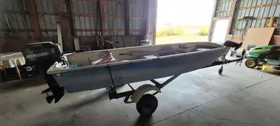 14.5" fiberglass fishing boat with 9.9 Mercury Motor & trailer for sale! Everything in great shape!...
