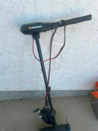 Used for less than two hours. Has extension handle. 80 lb thrust transom mount. Lots of power for a...