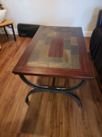 Posting for friend. Tiled heavy coffee table.