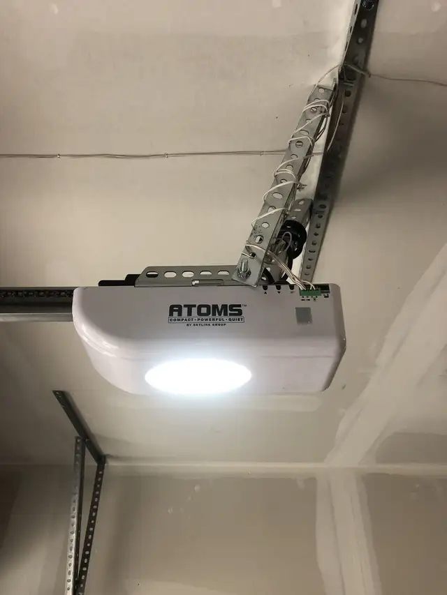 Garage door repair and opener installation 63235338577667123