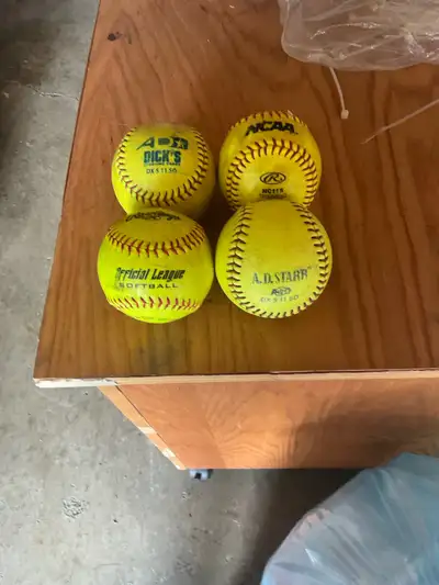 4 softballs, View more